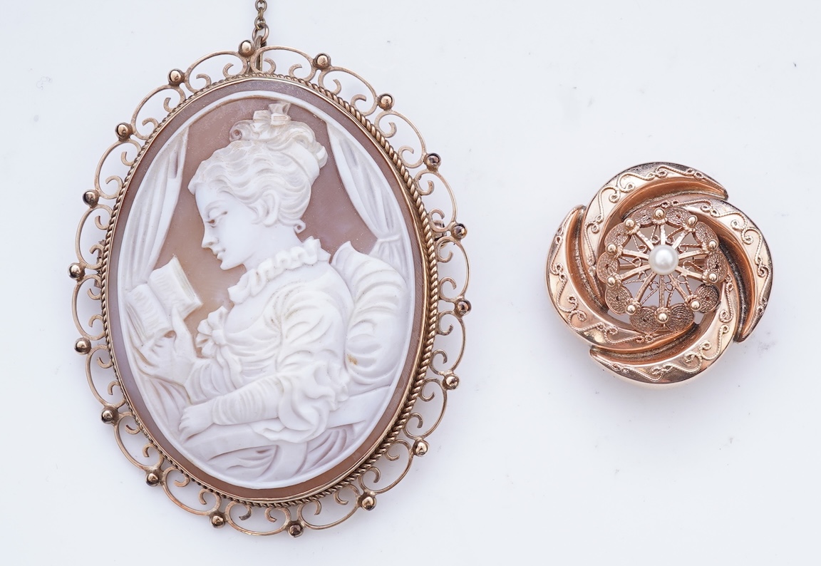 A shell cameo brooch and a gold and cultured pearl brooch